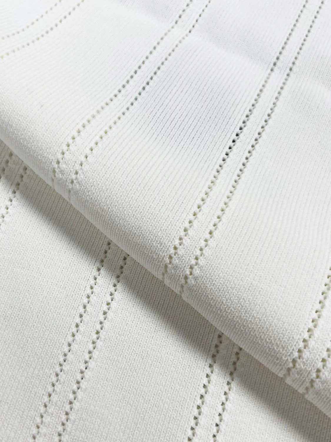Knit T-Shirts in white with vertical rib knit and stitched seam lines