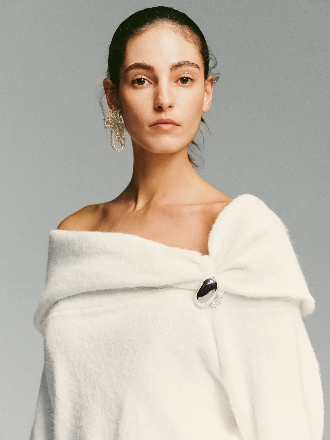 Metal Button Asymmetric Draped Long Sleeve Sweater in white knit fabric