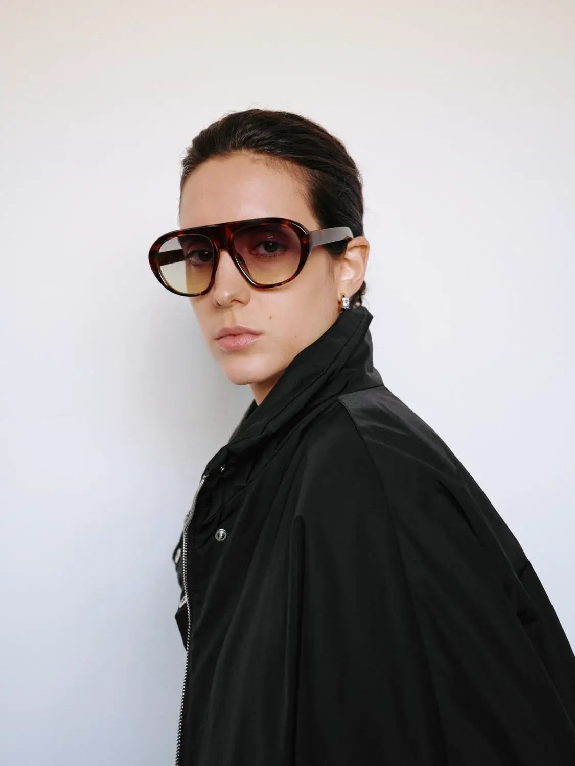 Padded Jacket, black, zip-front, worn by model with oversized sunglasses.