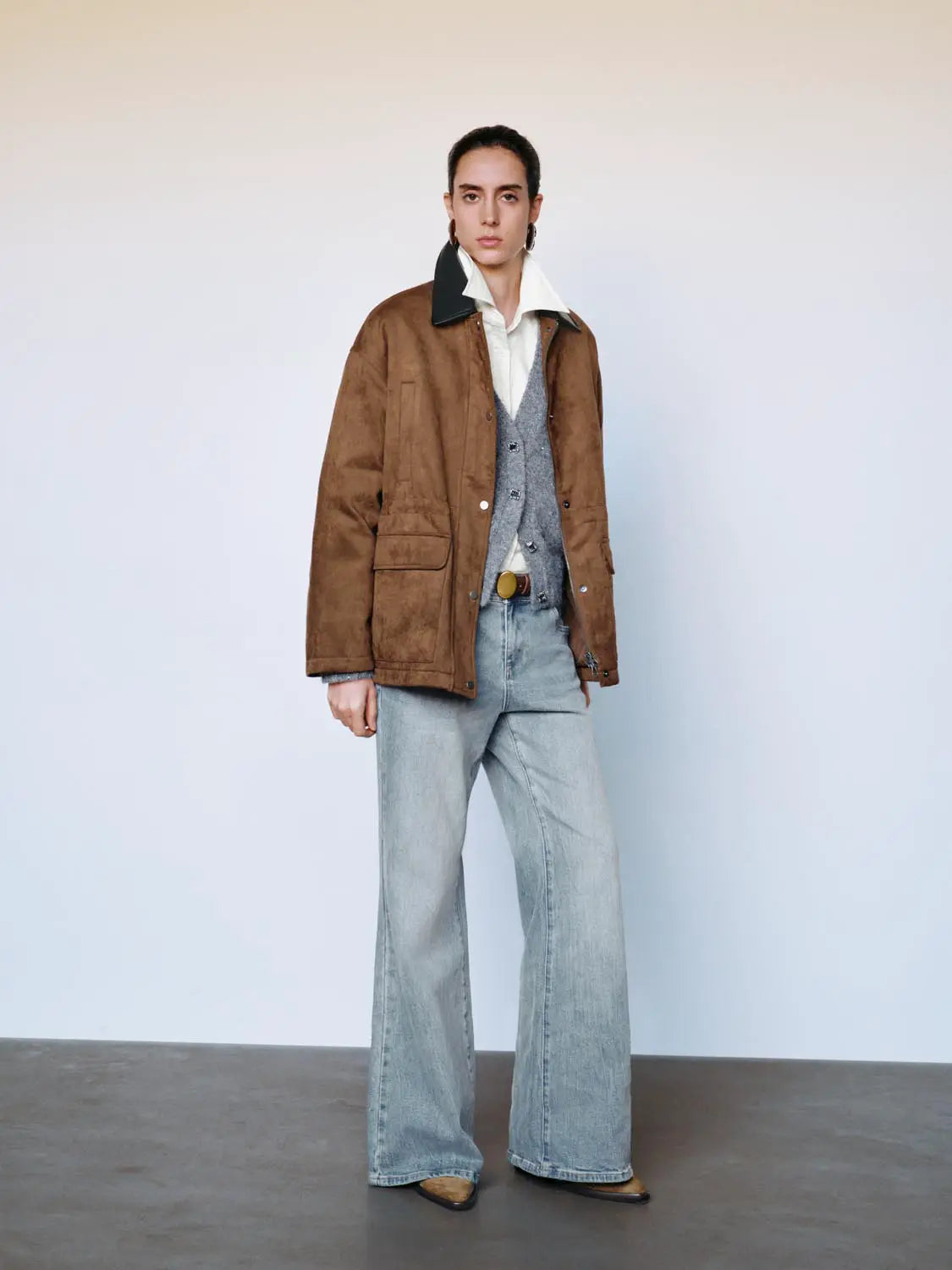 Padded Jacket Urban Revivo Fashion brown suede-look coat with black collar, shown over white shirt and grey vest.