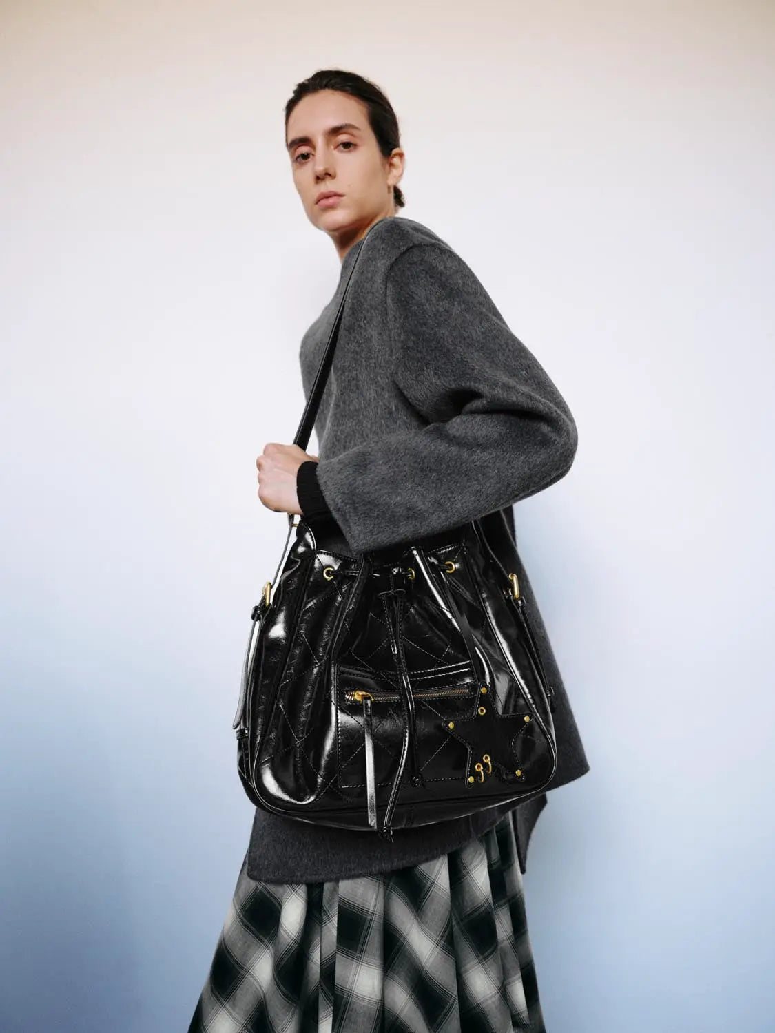 Grey wool coat by Urban Revivo Fashion with a black patent leather handbag