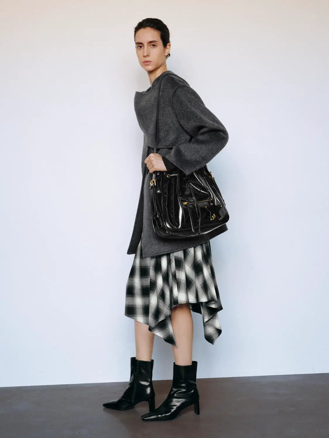 Coat by Urban Revivo Fashion; grey oversized wool coat paired with a black patent handbag.