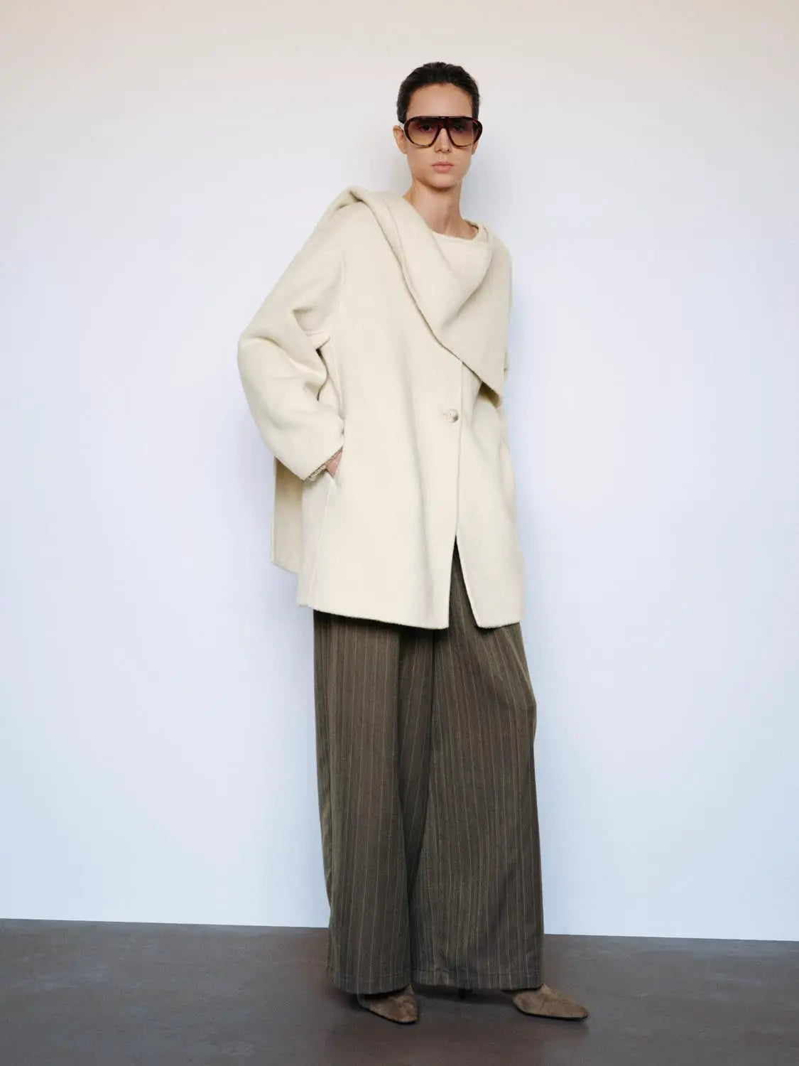 Coat, cream oversized wool with a large shawl collar.