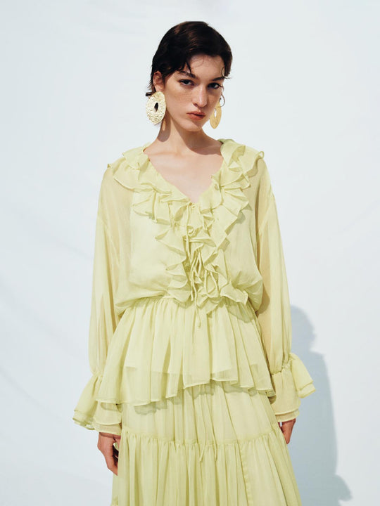 Chemises à volants au-dessus