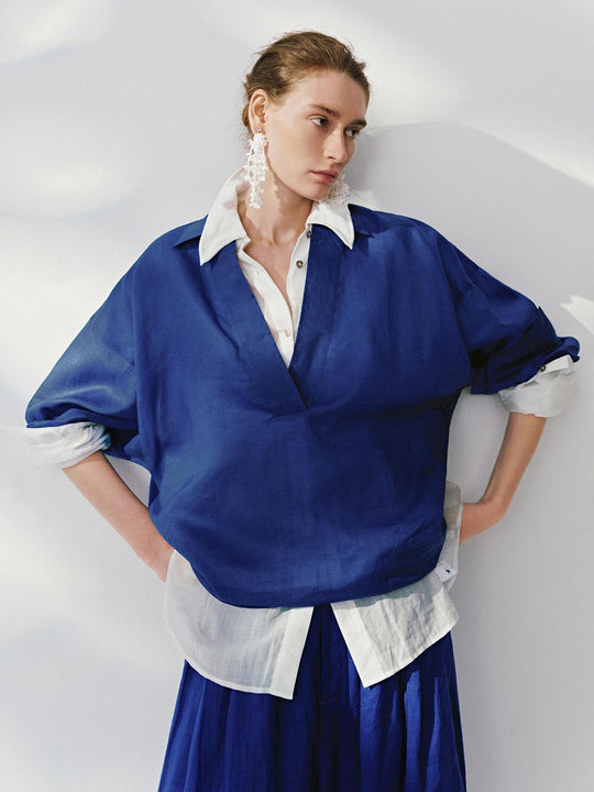 Magliette sopra la testa