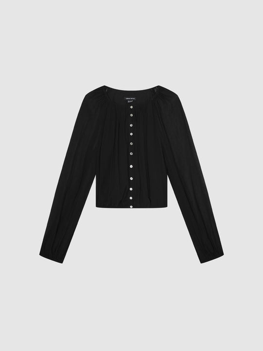 Camisas con detalle de botones en mangas transparentes