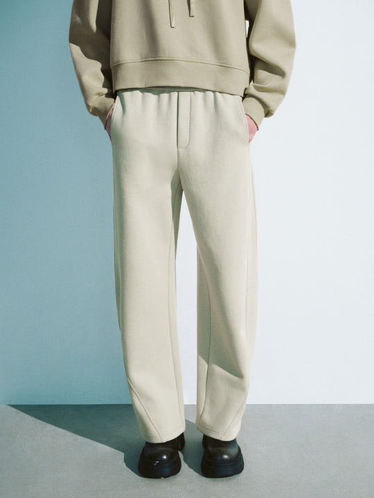 Pantaloni larghi a carota con coulisse in vita