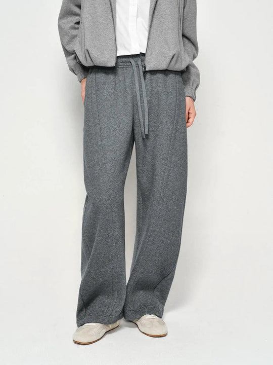 Pantalon en coton mélangé à jambe incurvée, taille à cordon et effet chiné