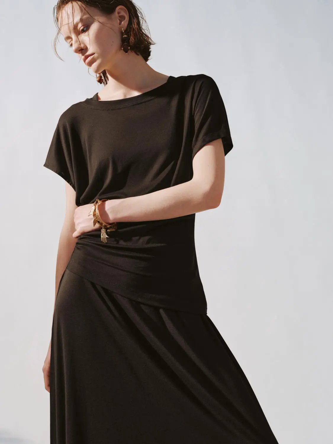 Boat-neck straight midi dress, black, with draped waist and short sleeves for a sleek versatile everyday look.