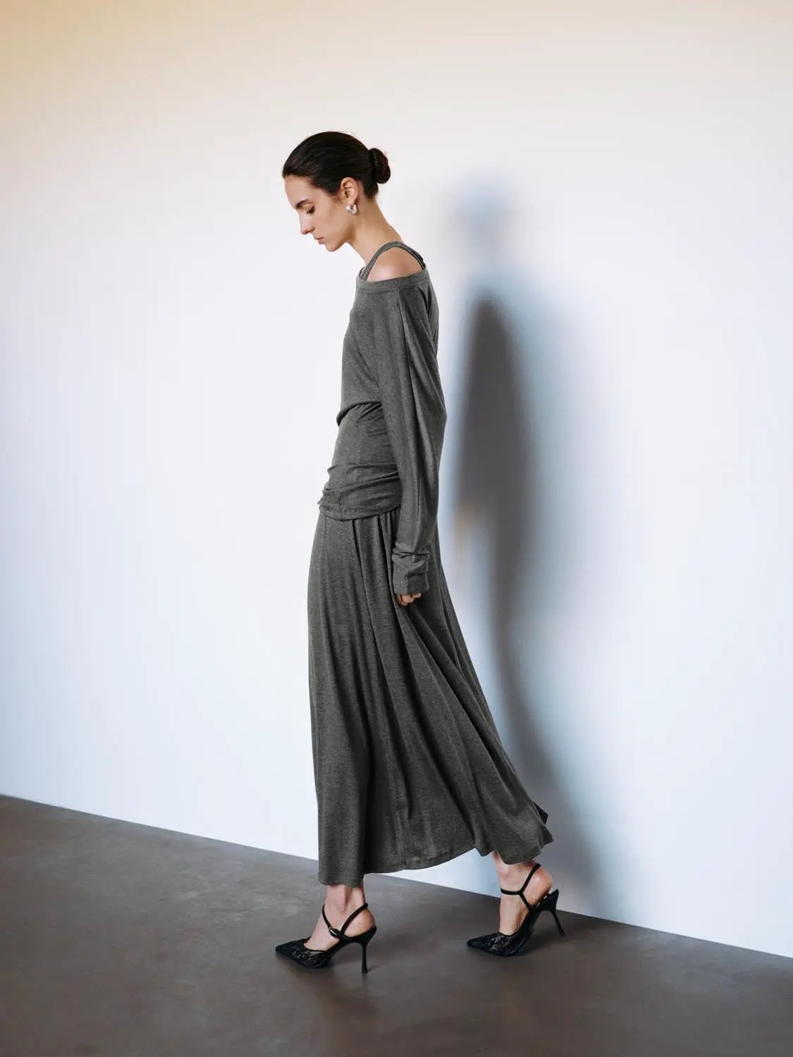 Ruched wrap crew-neck long-sleeve gray knit midi dress.