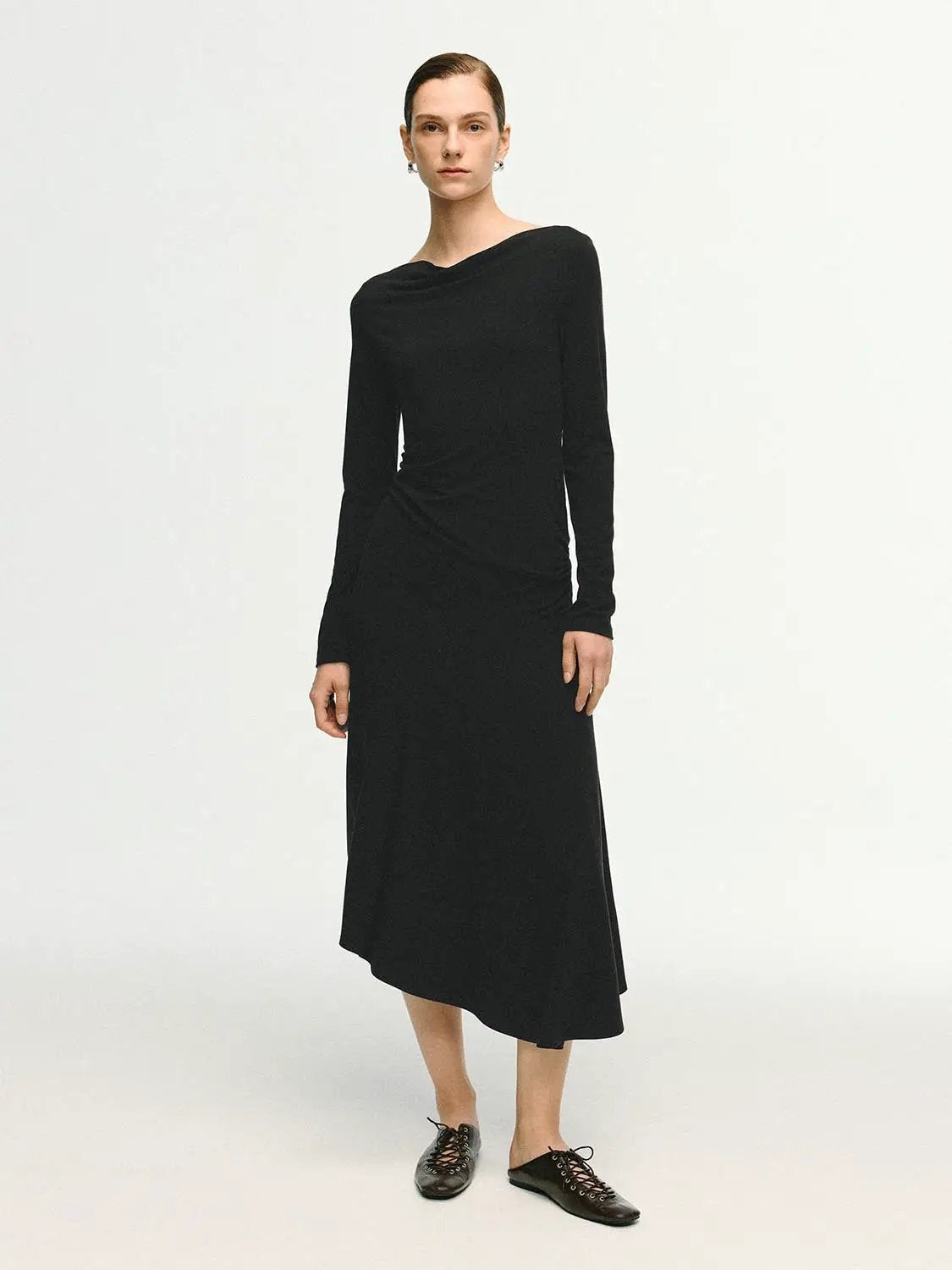 Cowl neck ruched long-sleeve midi dress in black with an asymmetric hem.