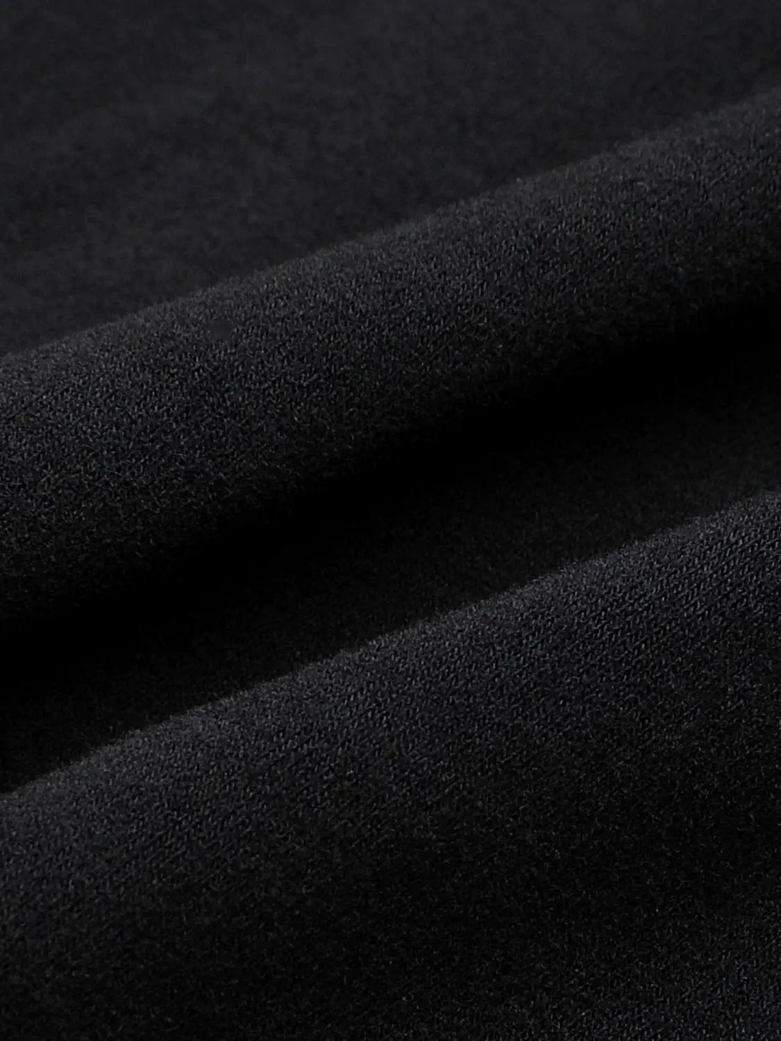 Cowl Neck Ruched Long Sleeve Asymmetric Hem Midi Dress fabric close-up in black by Urban Revivo.