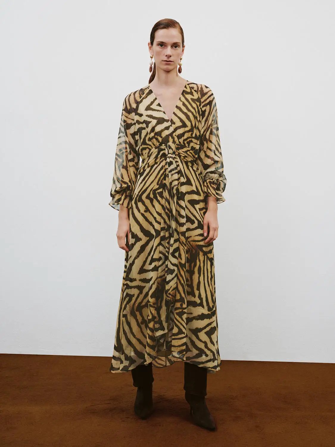 A-line dress by Urban Revivo Fashion in tiger print with waist tie and sheer fabric.