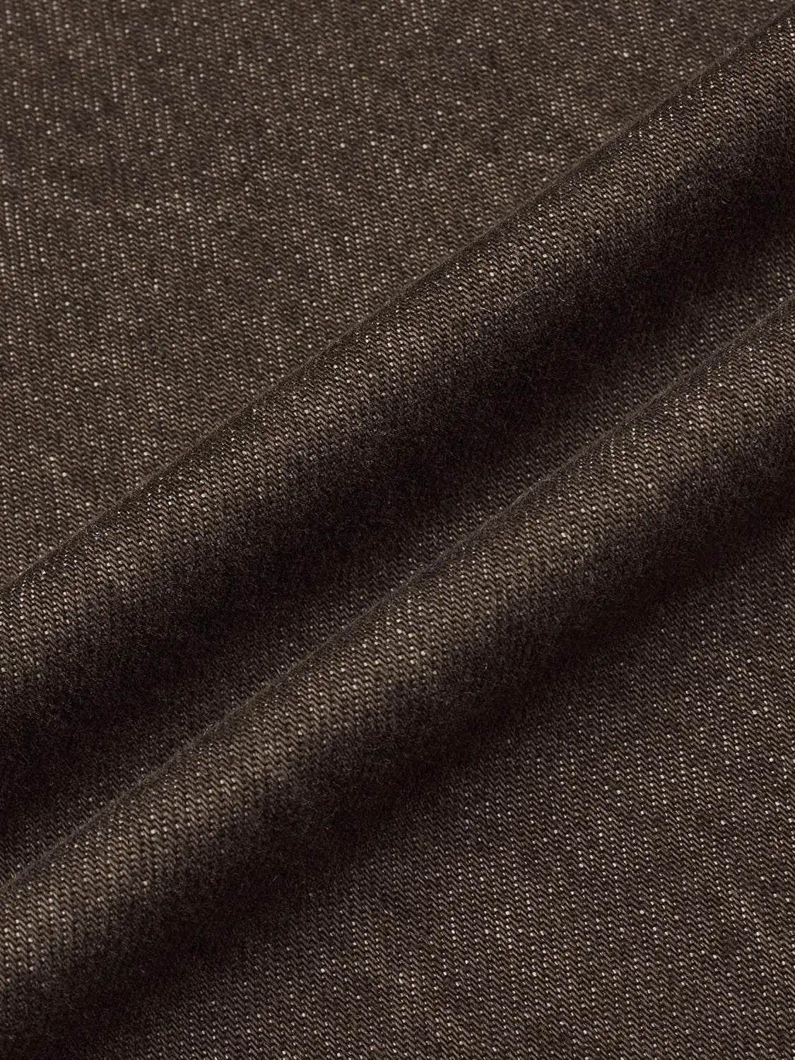 Denim jeans brown fabric texture close-up for high-waist loose wide-leg style