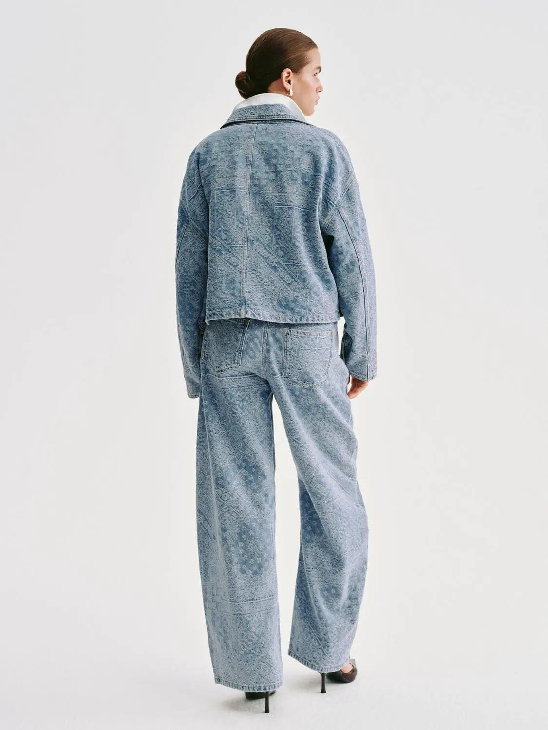 Jeans by Urban Revivo Fashion in light blue washed denim; back view.