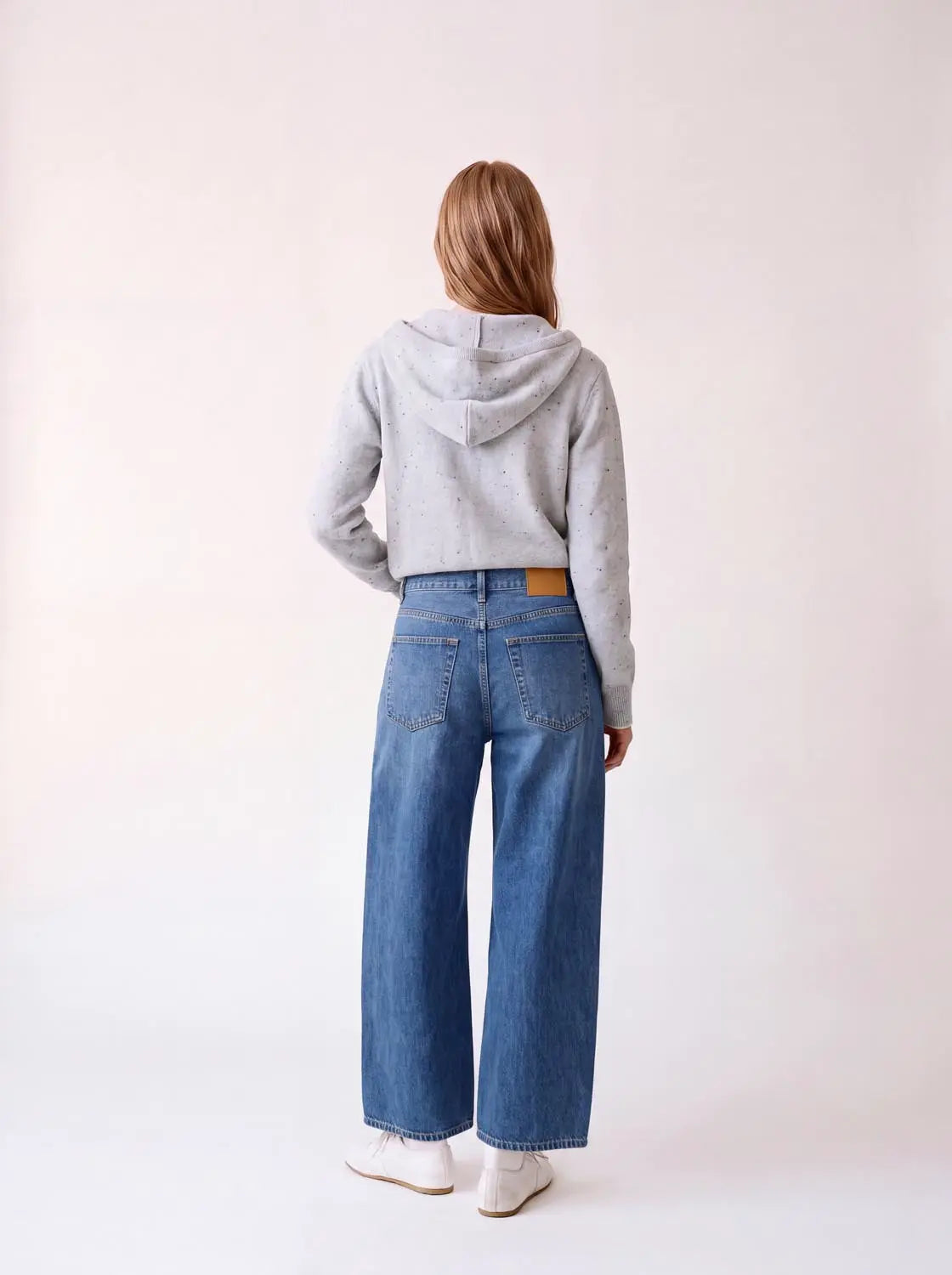 Jeans by Urban Revivo Fashion, light-wash wide-leg denim with back pockets and brown leather patch.