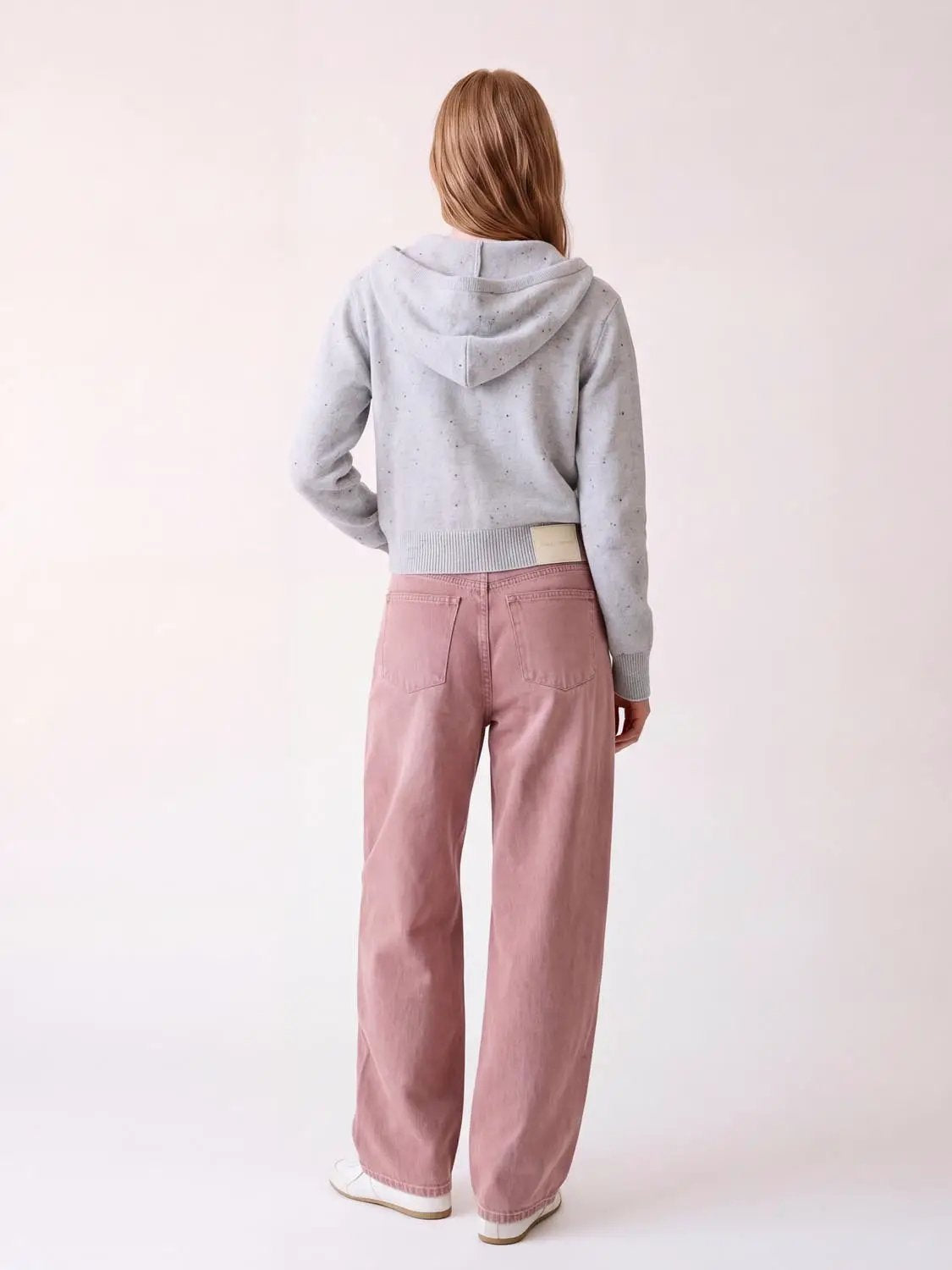 Casual jeans, dusty pink wide-leg with back pockets, back view