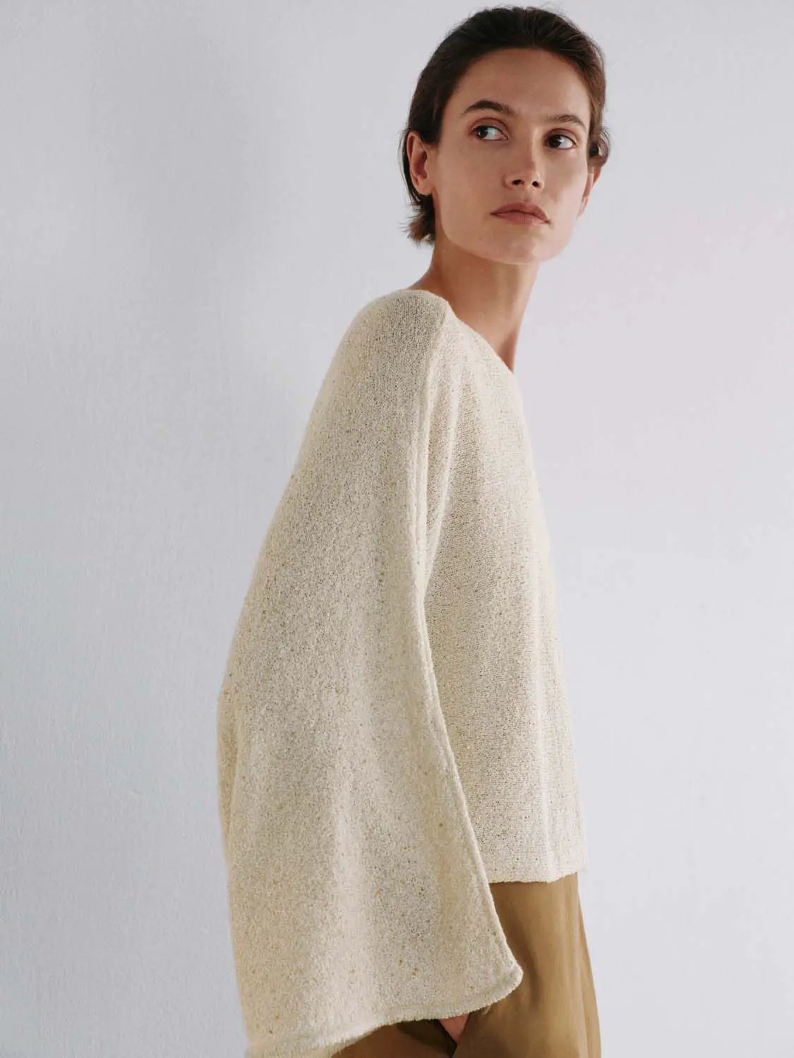 Oversized cropped textured boat-neck drop-shoulder sweater in cream knit