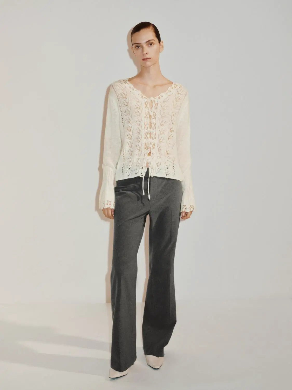 Textured button-front cardigan by Urban Revivo in ivory with V-neck, long sleeves and tie waist