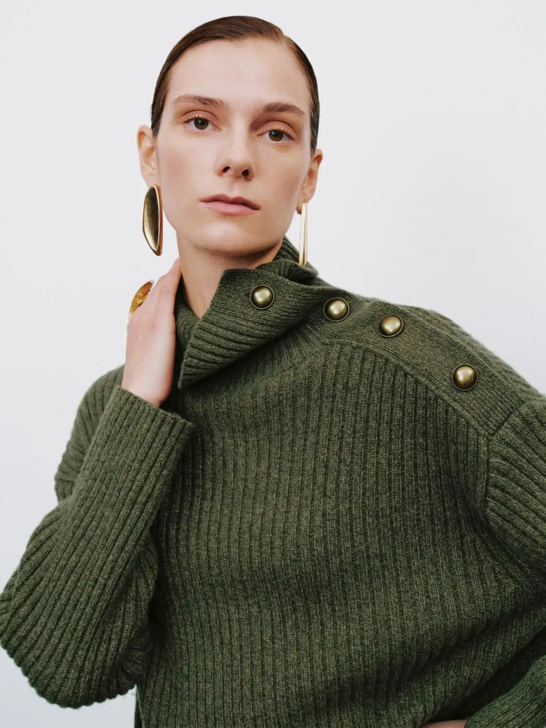 Ribbed asymmetric button long sleeve sweater in olive green knit with shoulder buttons