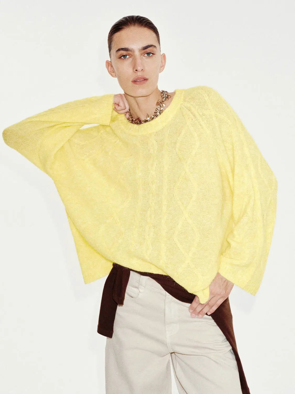 Knit T-Shirt by Urban Revivo Fashion; bright yellow loose-knit with a cable pattern and an oversized silhouette.
