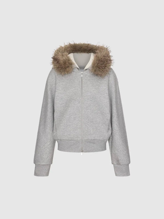 Chaqueta forrada de algodón, con cuello de pelo sintético, manga larga, cierre frontal completo de cremallera y puños y bajo acanalados