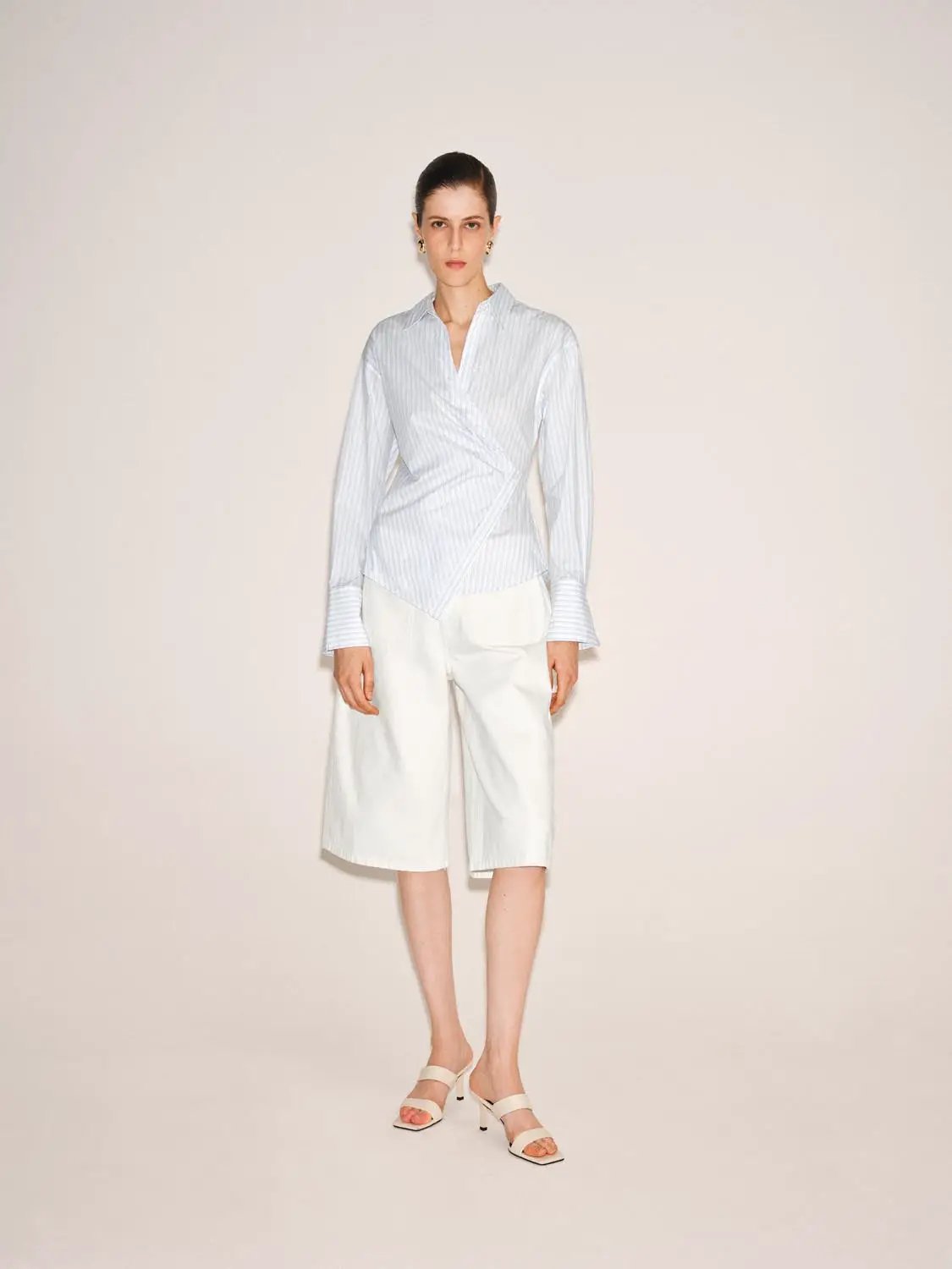 Shirt by Urban Revivo Fashion; light blue striped wrap shirt with long sleeves and asymmetric hem.