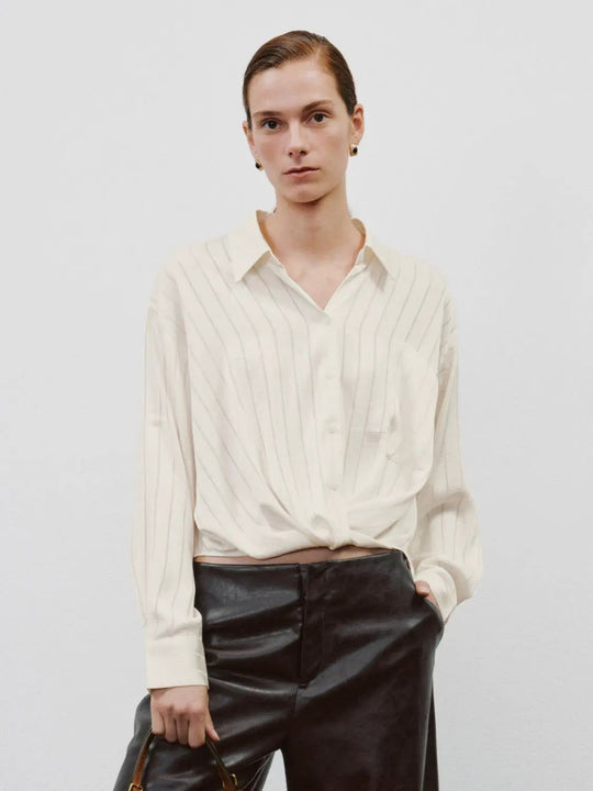 Blusa de manga larga a rayas con cuello de camisa retorcido