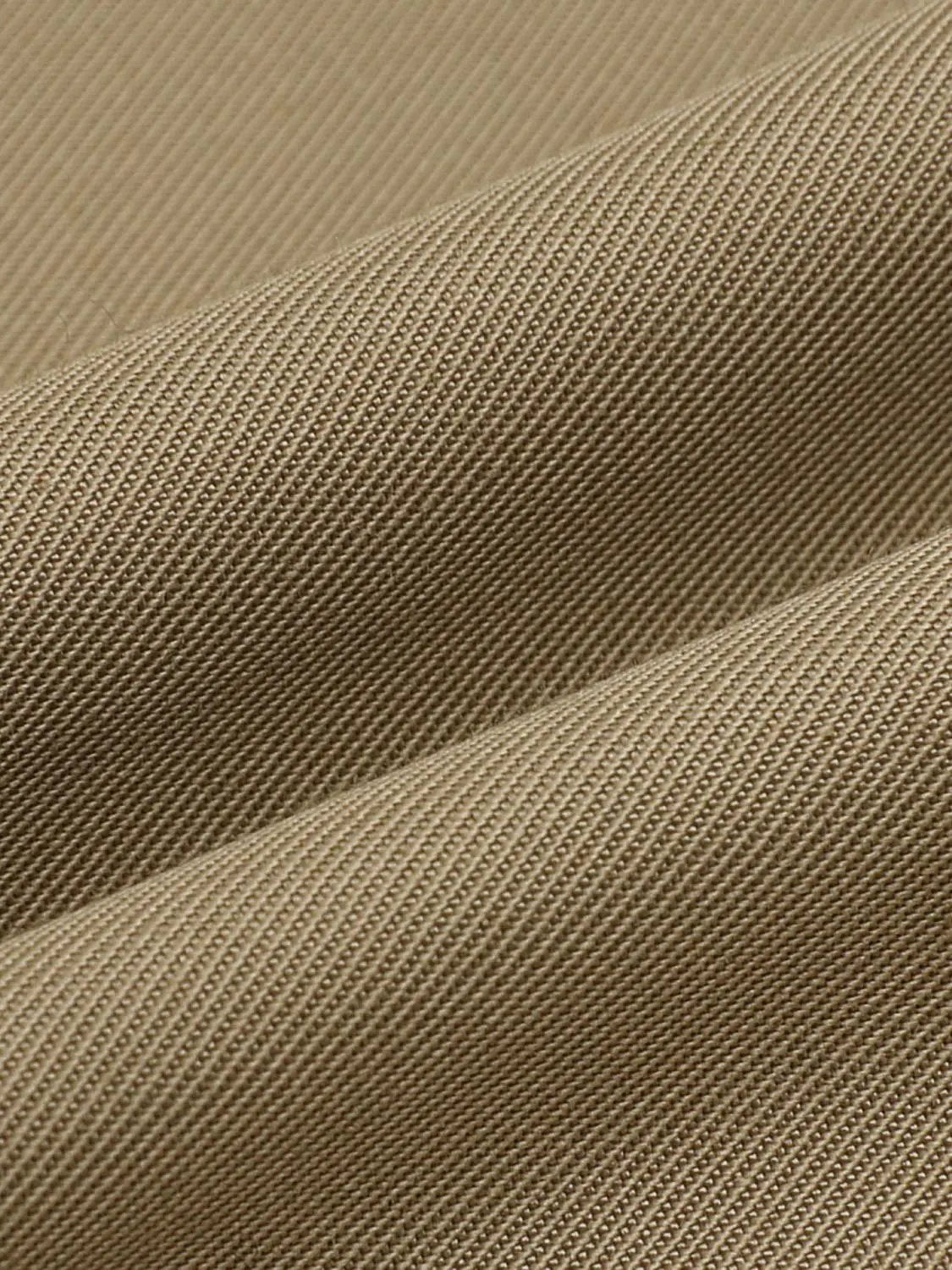 Pleated mid-rise belted A-line midi skirt; tan twill fabric.