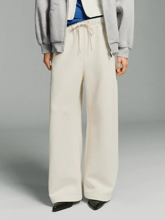 Pantalon ample à jambes larges, en coton épais légèrement extensible, avec taille à cordon de serrage