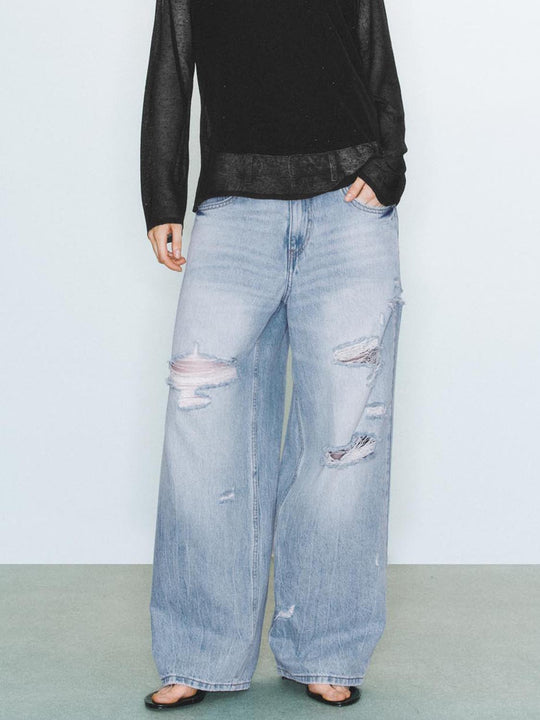 Jeans in denim strappato