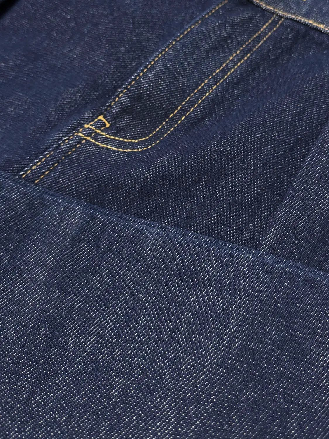Jeans by Urban Revivo Fashion; dark indigo denim with yellow contrast stitching
