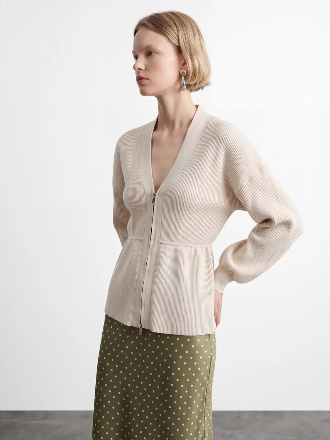 Zip Up Balloon Sleeve Knitted Cardigan in cream with ribbed texture