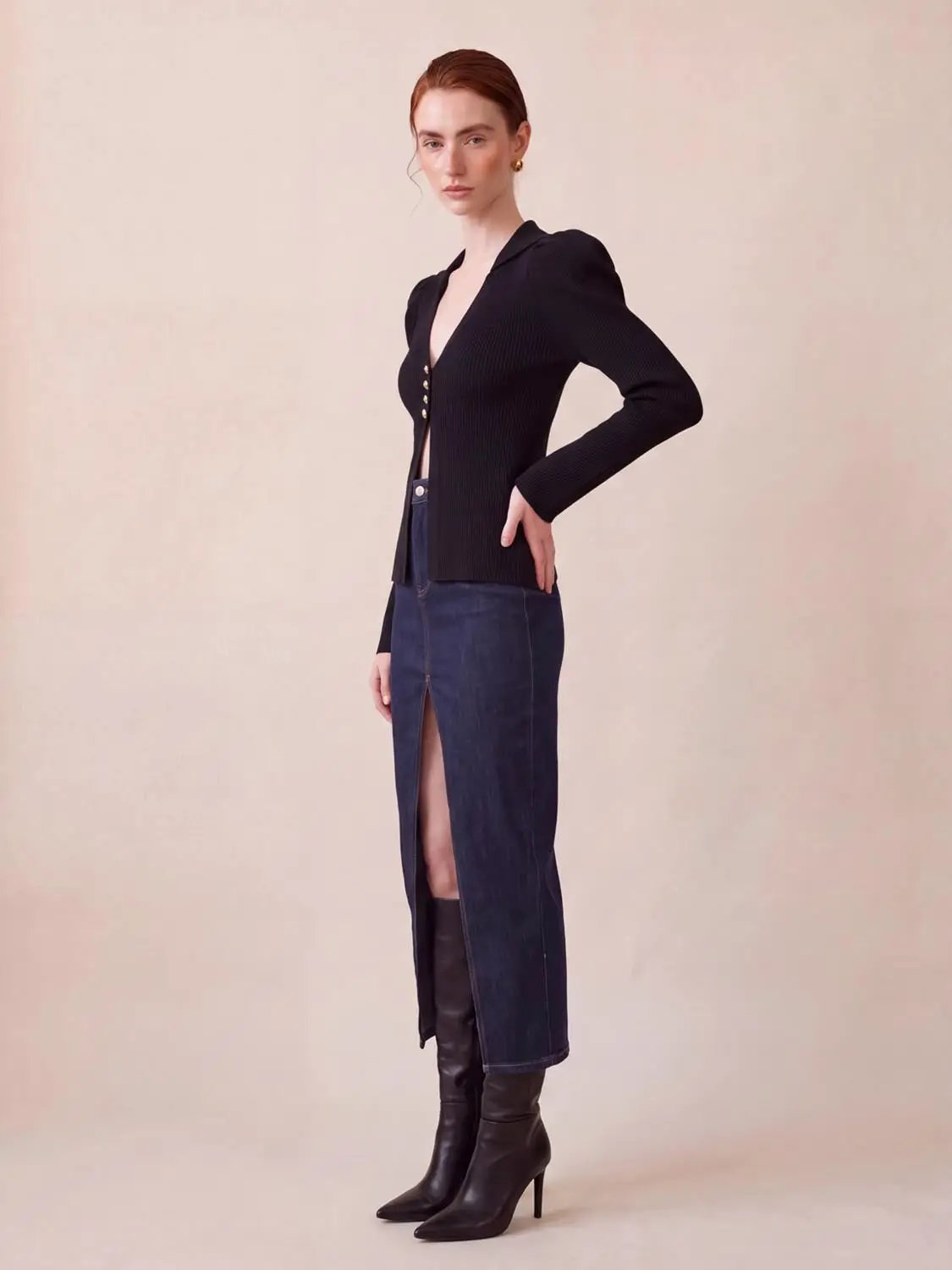 Puff Shoulder Tailored Knitted Cardigan in black knit with gold-tone buttons.
