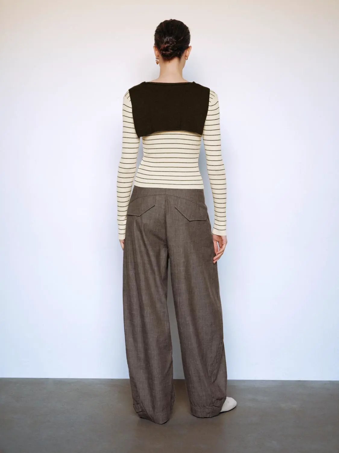 Striped knitted T-shirt with black shawl overlay, cream base, long sleeves