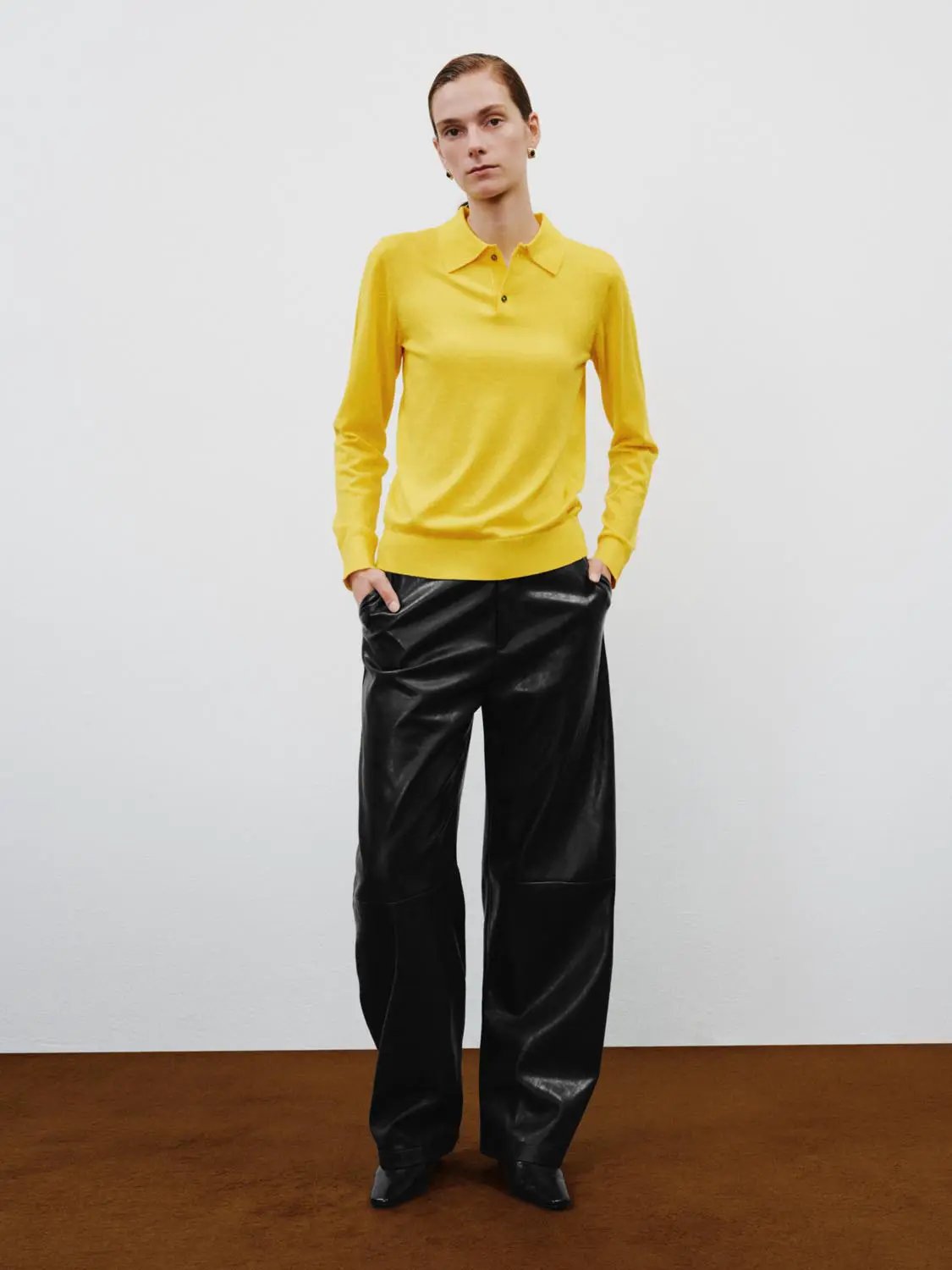 Polo Collar Long Sleeve Fitted Knit Sweater in yellow; paired with black wide-leg pants