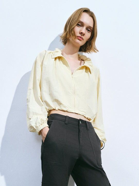 Veste droite à col montant et fermeture éclair devant