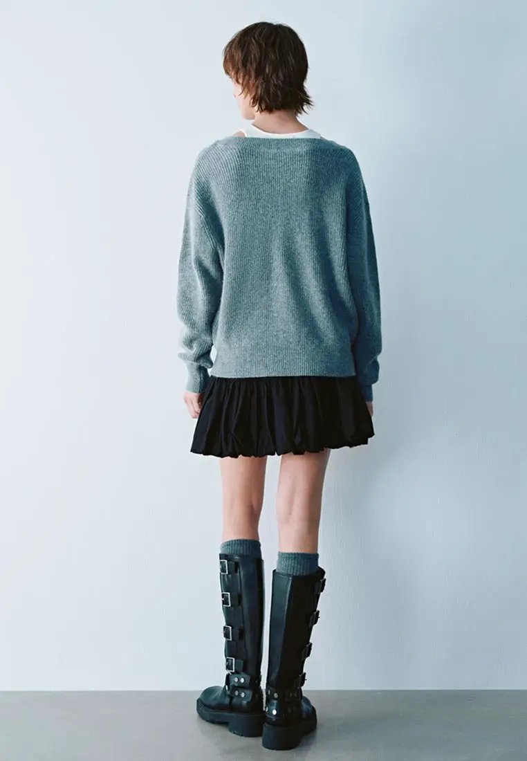 Cotton leopard print tiered ruffle skirt in black; back view on model