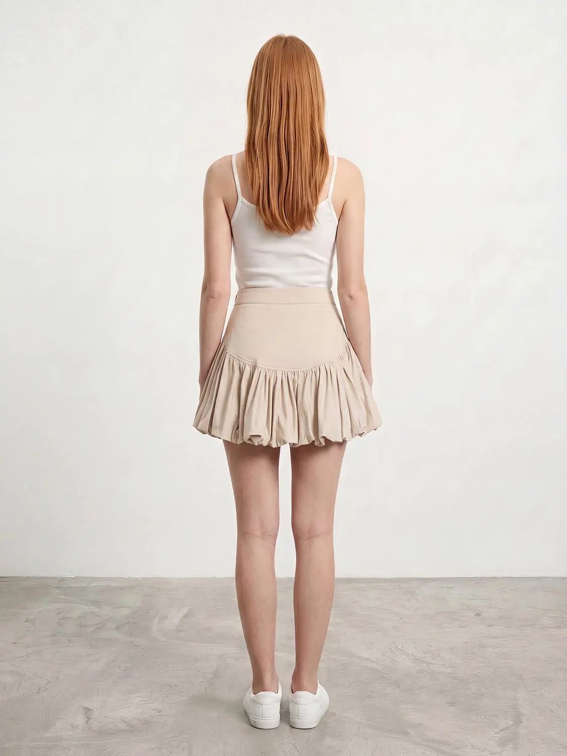 Cotton leopard-print tiered ruffle skirt, beige A-line silhouette