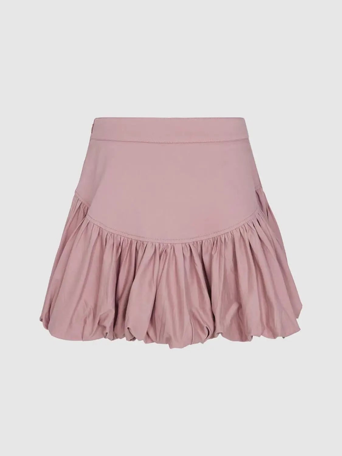Cotton A-line skirt with pink hue, wide waistband, and tiered ruffle hem