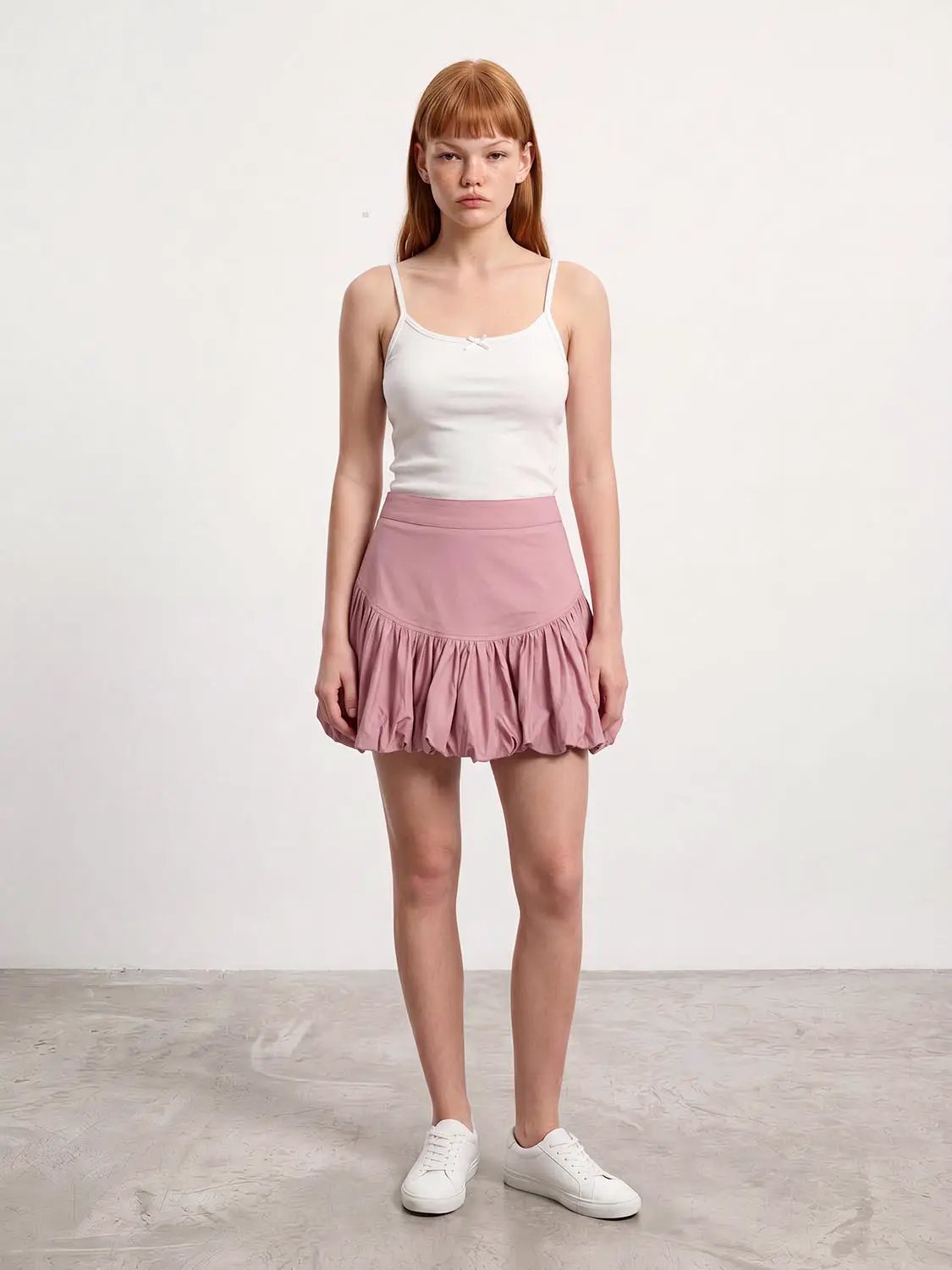 Cotton leopard print tiered ruffle skirt in pink, A-line silhouette.