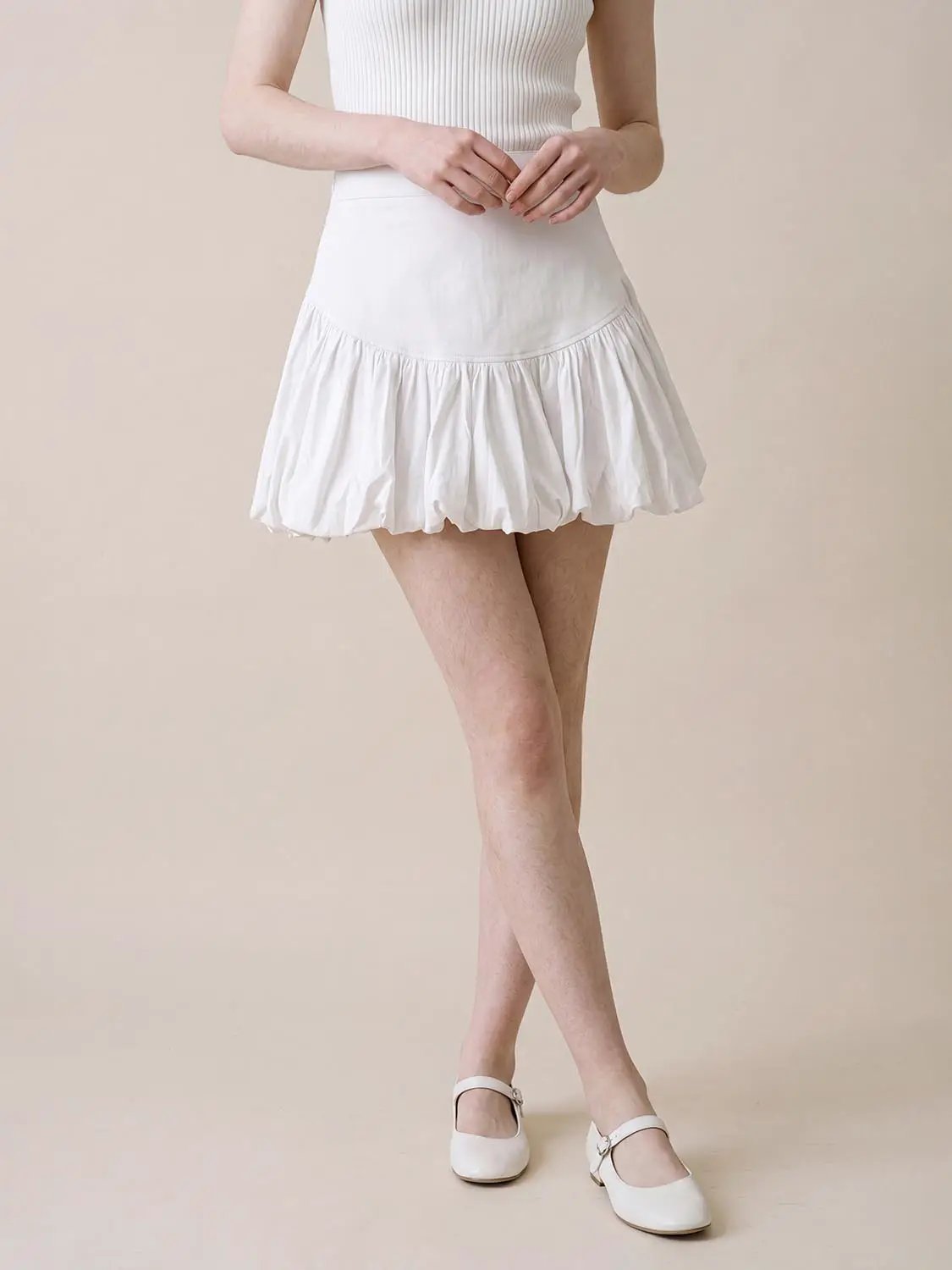 Cotton tiered ruffle A-line skirt in white worn by model