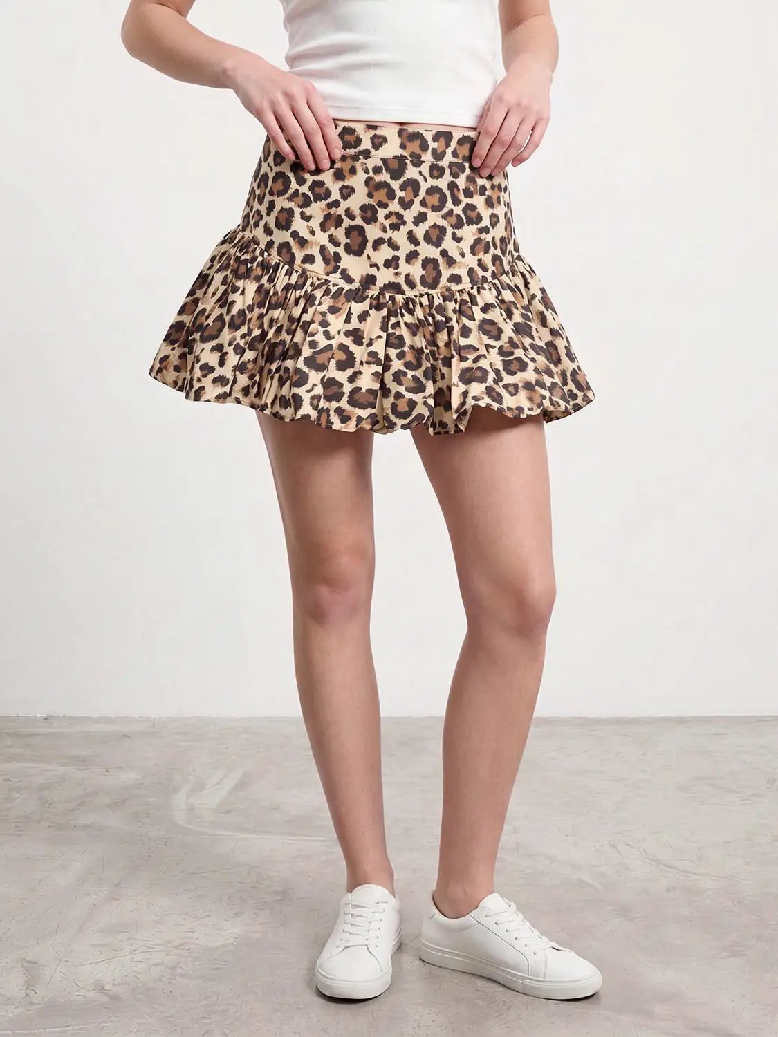 Cotton leopard print tiered ruffle skirt by Urban Revivo Fashion, A-line silhouette in tan/brown spots.