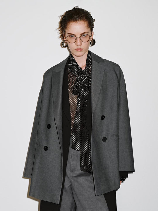 Blazer doppiopetto con rever a lancia