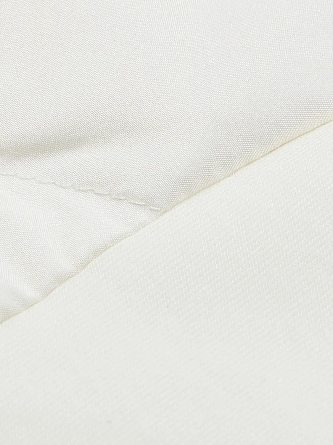 Down Jacket Urban Revivo Fashion; cream textured fabric close-up with seam detail.
