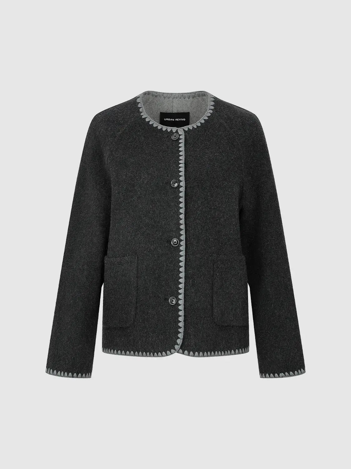 Coat by Urban Revivo in dark charcoal with grey trim along edges and front buttons.