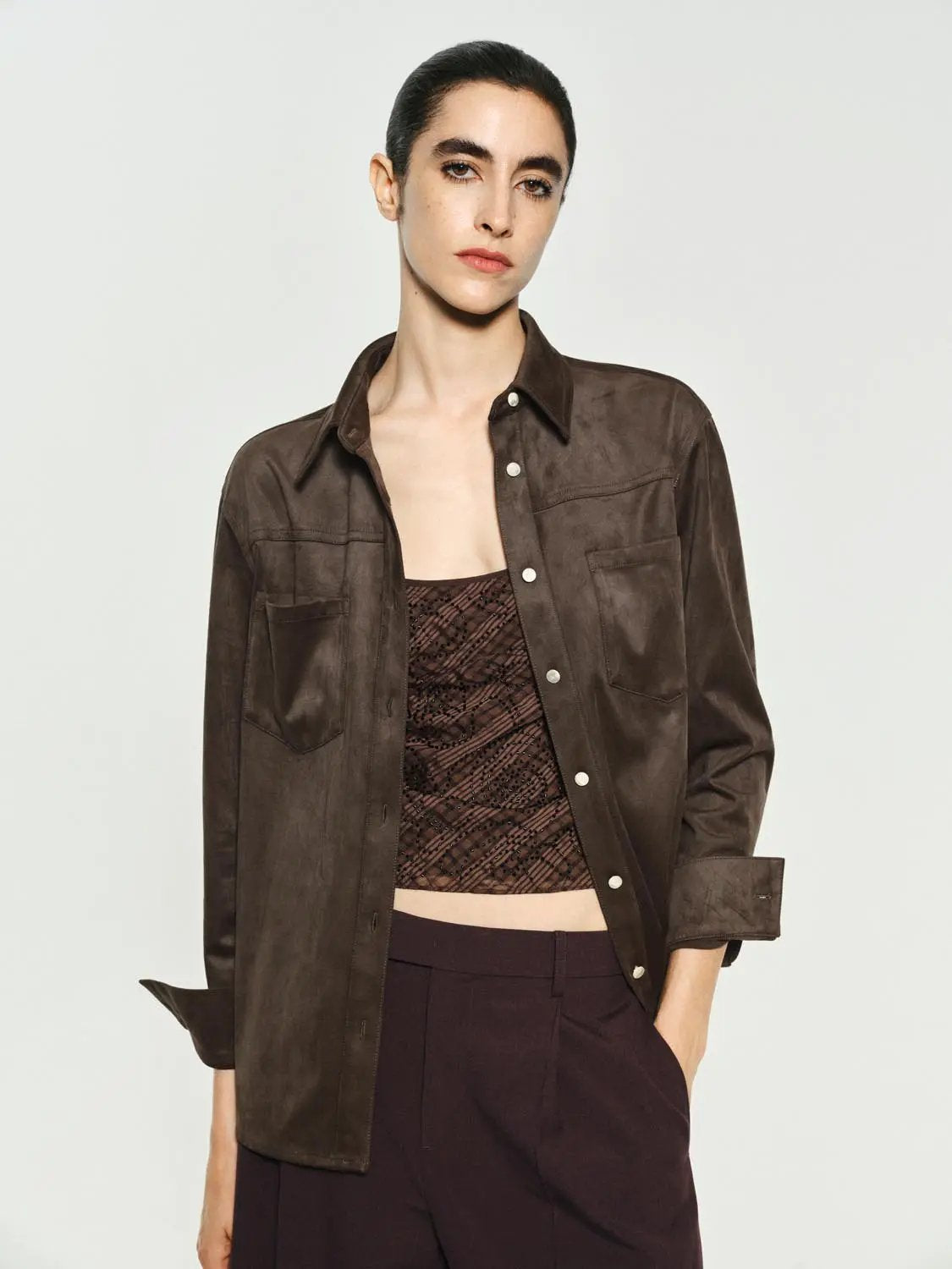 Button-Down Shirt by Urban Revivo Fashion; brown suede-like fabric with white snap buttons.
