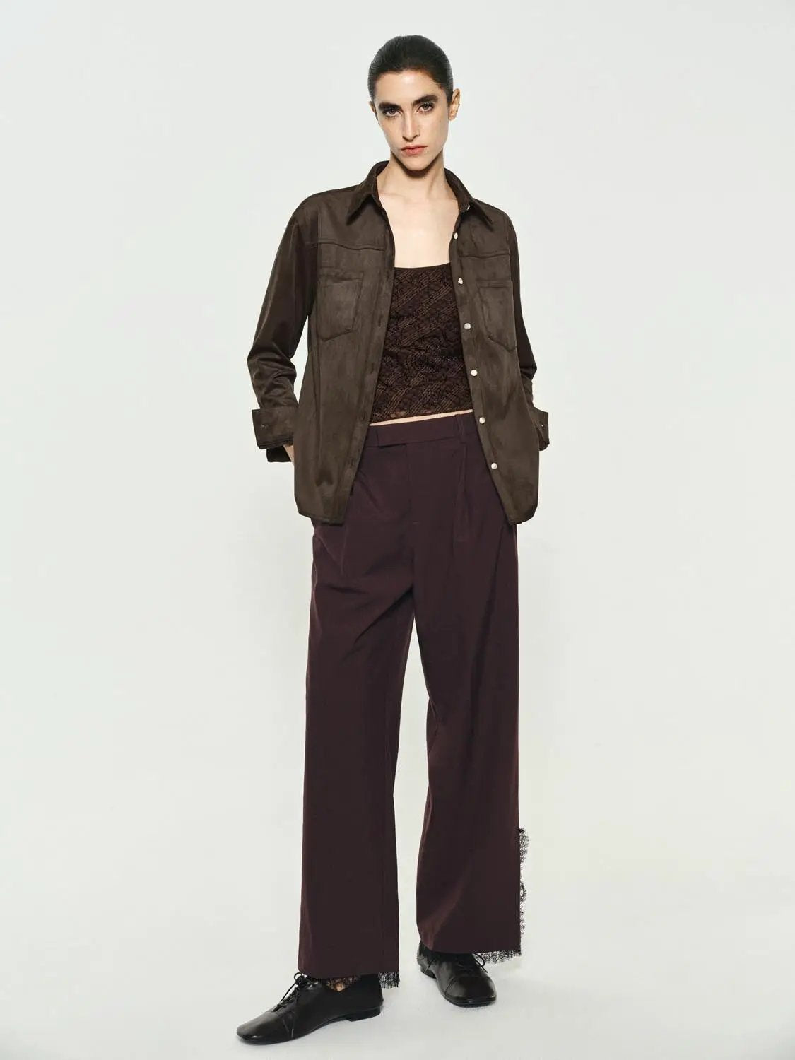 Button-down shirt, brown suede with chest pockets, worn with burgundy wide-leg pants