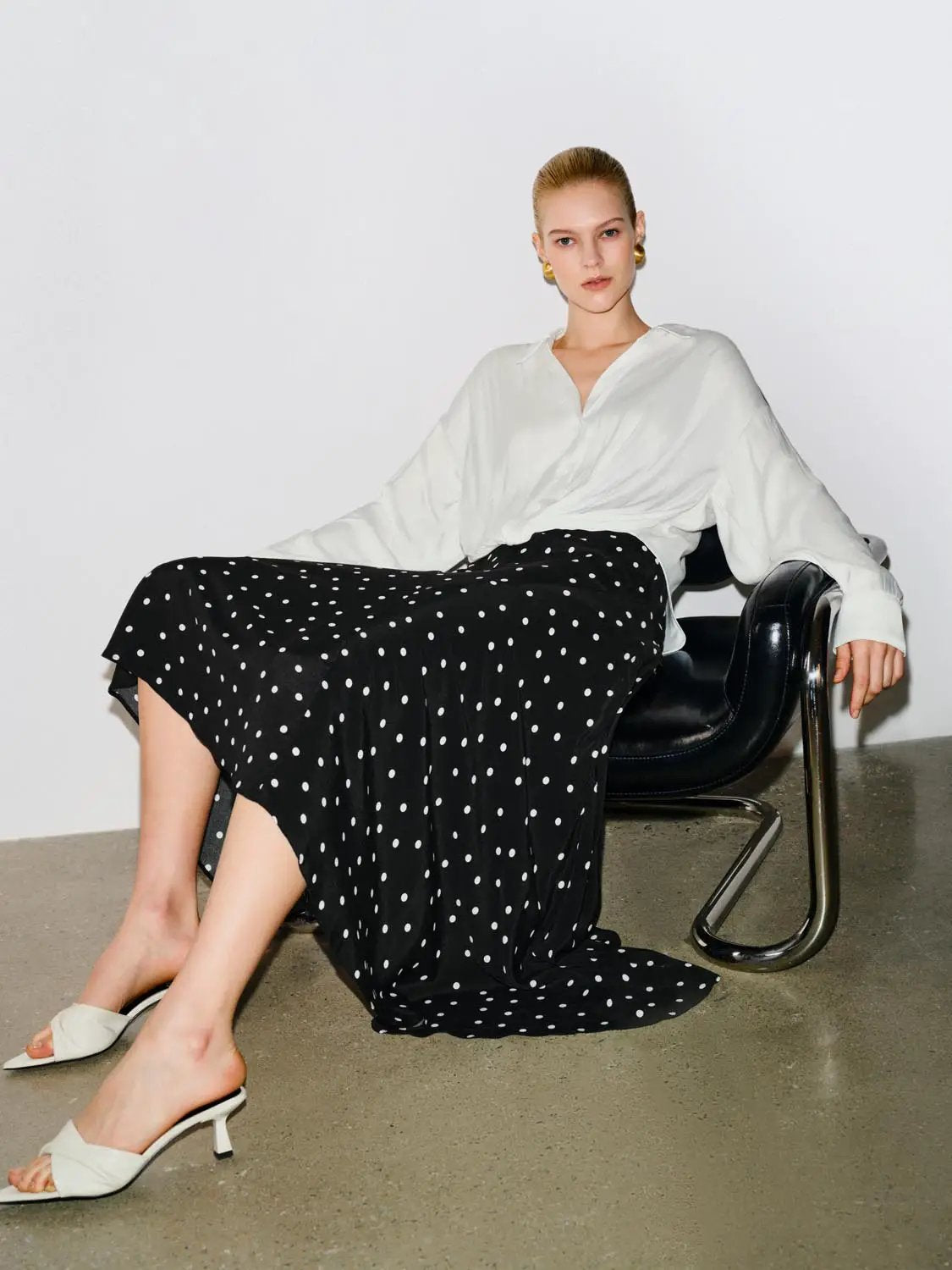Polka Dot Asymmetric Hem Maxi Wrap Skirt in black with white polka dots
