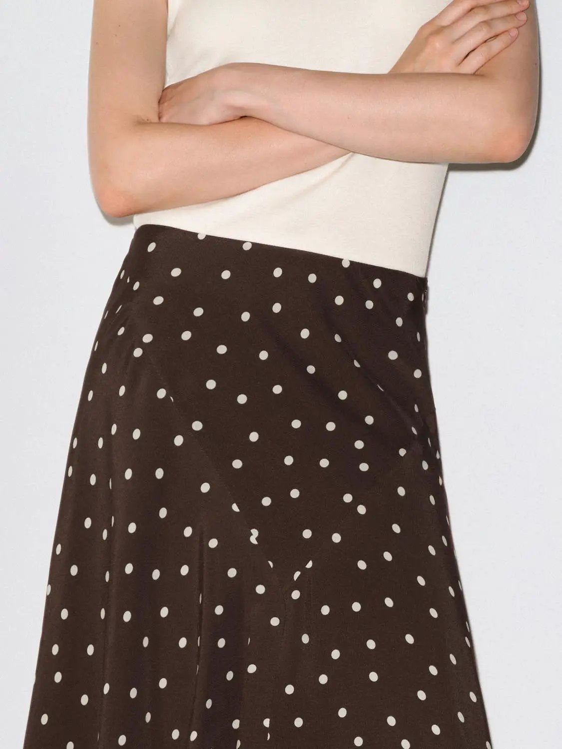 Polka Dot Asymmetric Hem Maxi Wrap Skirt in brown with white polka dots